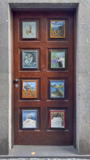 Colourfully painted doors on Santa Maria Street in the old town, Funchal, Madeira, Portugal