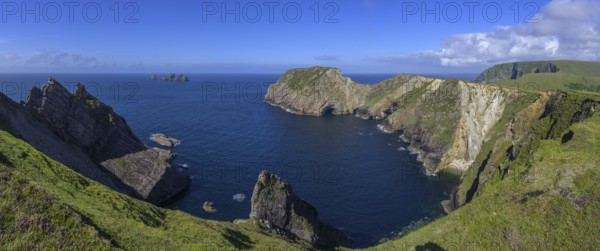 View of blue sea and cliffs with rock gate from Portacloy Loop Cliff Walk, Muingnabo, County Mayo, Ireland