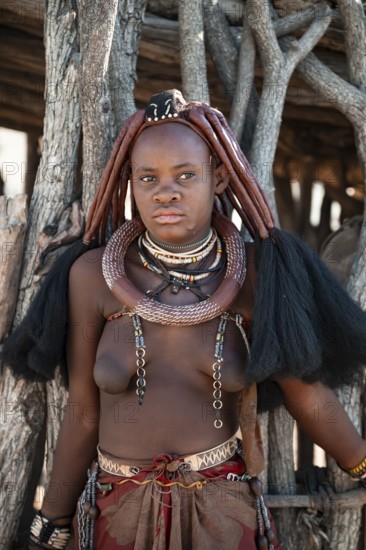 Young woman, Himba woman, traditional Himba village, Kaokoveld, Kunene, Namibia