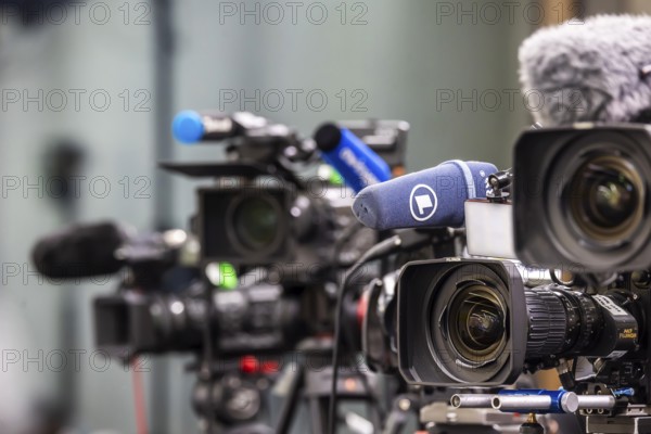 Cameras from various television stations are prepared for a press conference. Stuttgart, Baden-Württemberg, Germany