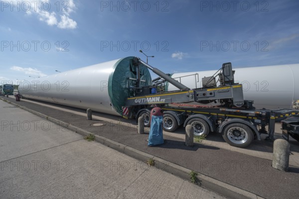 Overlong heavy-duty transporter with a part of a wind turbine, at a motorway rest area of the A9, Mecklenburg-Western Pomerania, Germany