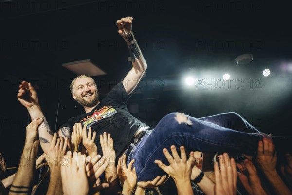 Billy Lunn, singer and guitarist from The Subways, crowd-surfing the fans live on For Eternity Tour 2025 at Hole44 in Berlin on 29.11.2025