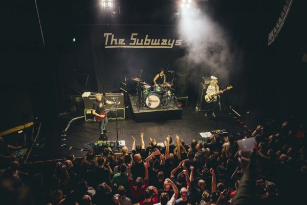 Billy Lunn (singer and guitarist), Camille Phillips (drummer) and Charlotte Cooper (singer and bassist) from The Subways live on For Eternity Tour 2025 at Hole44 in Berlin on 29.11.2025