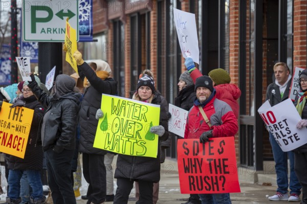 Saline, Michigan USA - 1 December 2025 - Rural Michigan residents rally against the $7 billion Stargate data center planned on southeast Michigan farm land. Protesters say the Data Center is being fast tracked by DTE Energy, the large electric utility, and that it could raise residential electricity rates and endanger the water supply