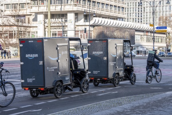 E-cargo bike, e-cargo bike delivery vehicle, pedal drives with e-motor assistance, from the mail-order company Amazon, from a micromobility center near Alexanderplatz, the electric mini transporters in the inner city area deliver over 1.5 million parcels annually, the manufacturer of the e-cargo bikes is the German company Mubea, from Sauerland, Germany