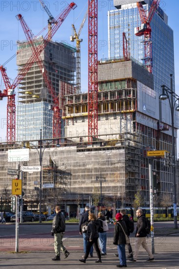 Construction site of the Covivio skyscraper in front, in the vicinity of Alexanderplatz in Berlin, mixed use of apartment, offices, retail and a daycare center, the high-rise construction site of The Berlinian office high-rise building in the back, Germany
