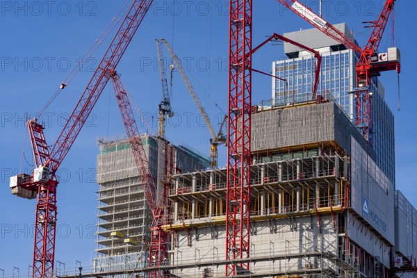 Construction site of the Covivio skyscraper in front, in the vicinity of Alexanderplatz in Berlin, mixed use of apartment, offices, retail and a daycare center, the high-rise construction site of The Berlinian office high-rise building in the back, Germany