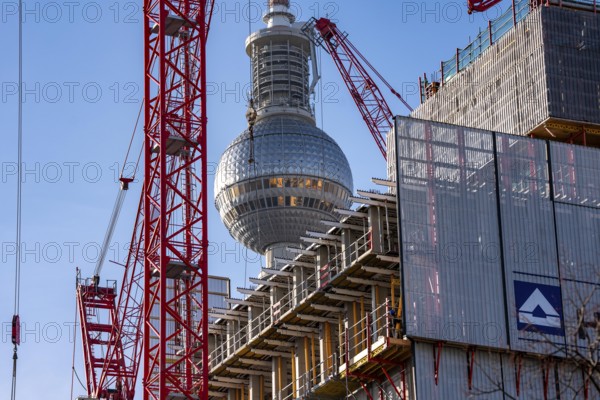 Construction site of the Covivio high-rise building in the vicinity of Alexanderplatz in Berlin, mixed use of apartment, offices, retail and a daycare center, Berlin TV Tower dome, Germany