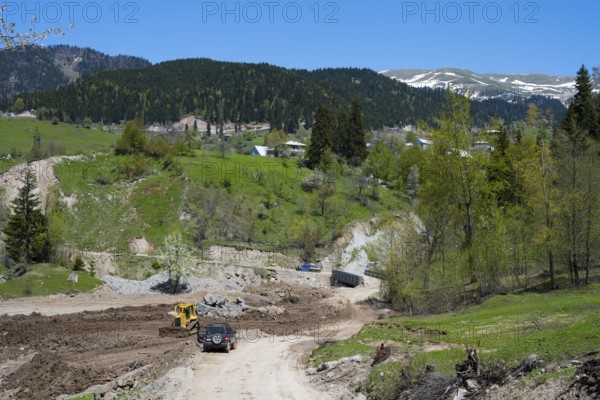 A construction site on a dirt road in a hilly forest landscape, on the way to the Goderdzi Pass, Ajara region, Adjara, Autonomous Republic, Georgia