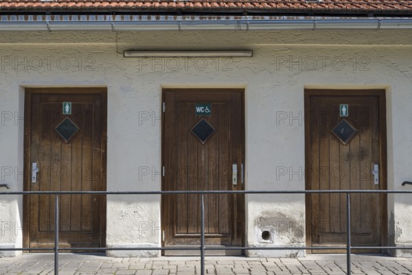 Building with doors to toilets, Schliersee, Upper Bavaria, Bavaria, Germany