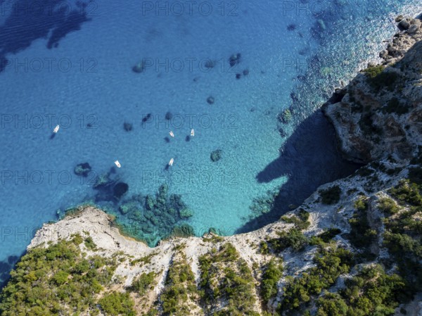 Picturesque rocky coast, cliffs and turquoise blue sea, top-down, aerial view, Golfo di Orosei, Baunei, Sardinia, Italy