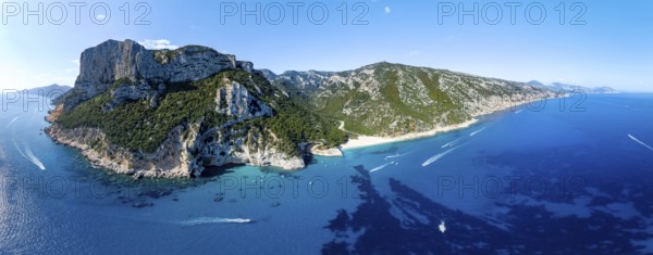 Picturesque rocky coast, cliffs and Cala Sisine beach, aerial view, Golfo di Orosei, Baunei, Sardinia, Italy