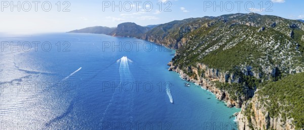 Picturesque rocky coast, cliffs and blue sea, aerial view, Golfo di Orosei, Baunei, Sardinia, Italy