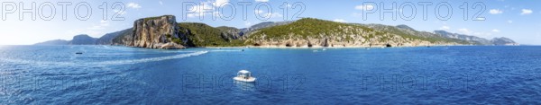Panorama, picturesque rocky coast, cliffs and Cala Luna beach, aerial view, Golfo di Orosei, Baunei, Sardinia, Italy