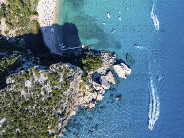 Picturesque rocky coast, cliffs and Cala Luna beach, aerial view, top-down, Golfo di Orosei, Baunei, Sardinia, Italy
