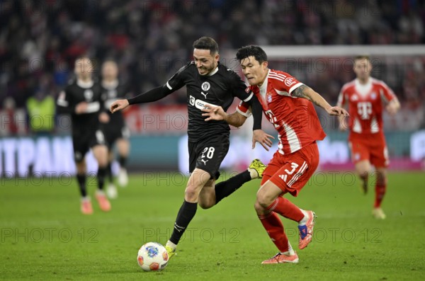 Duel, action Min-jae Kim FC Bayern Munich FCB (03) against Mathias Pereira Lage FC St. Pauli (28) Allianz Arena, Munich, Bayern, Germany