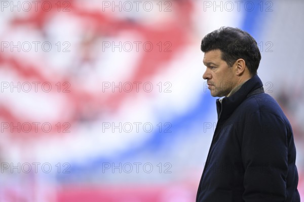 TV expert Michael Ballack in front of Logo FC Bayern Munich, Allianz Arena, Munich, Bavaria, Germany