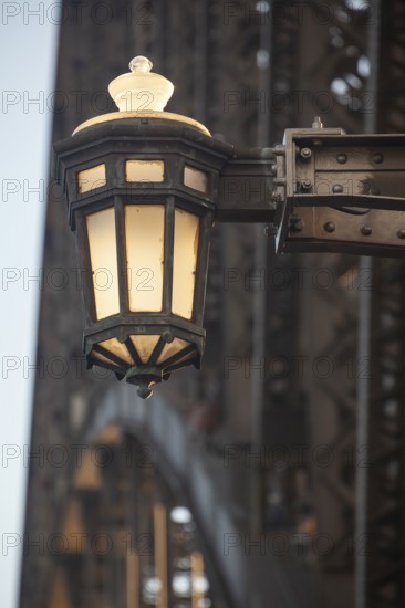 Details of the famous Sydney Harbour Bridge in the evening light, New South Wales, Australia. Decorative lamp on steel arm with studs