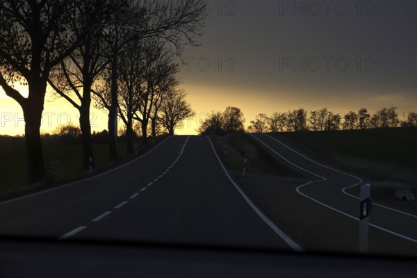 Street in late autumn, sunset, Germany