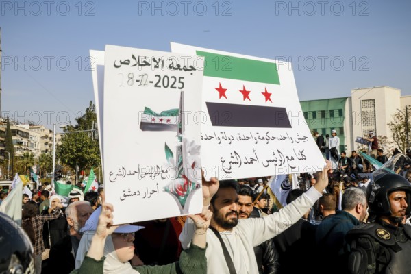 Damascus, Syria. November 28, 2025: Thousands of Syrians gather in Umayyad Square in central Damascus to celebrate the anniversary of the military operation that led to the fall of Bashar al-Assad's regime. Demonstrators express joy and unity while denouncing Israeli attacks on Syrian territory, Damascus, Damascus, Syria