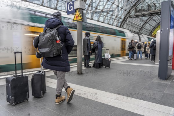 Central Station in Berlin, passengers on the platform, train arrives, Germany
