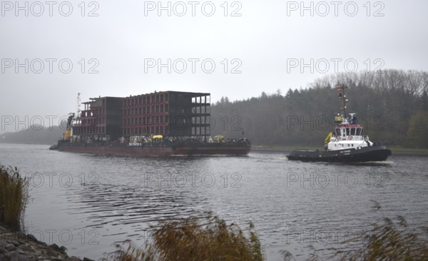 Tugboats transport parts of a ship in fog through the Kiel Canal, NOK, Kiel Canal, Kiel Canal, Schleswig-Holstein, Germany