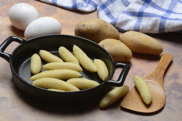 Raw Schupfnudeln in pan, type of pasta, Germany