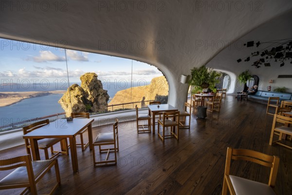 Cafe with panoramic window, interior at the Mirador del Río viewpoint, designed by artist César Manrique, Lanzarote, Canary Islands, Spain