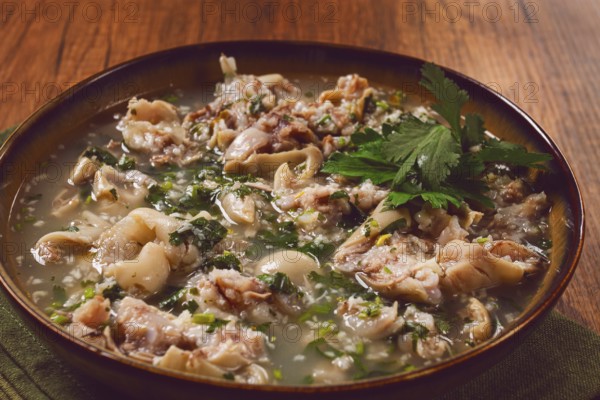 Muzhuzhi, a Georgian dish made from pork legs, with spices and herbs, homemade