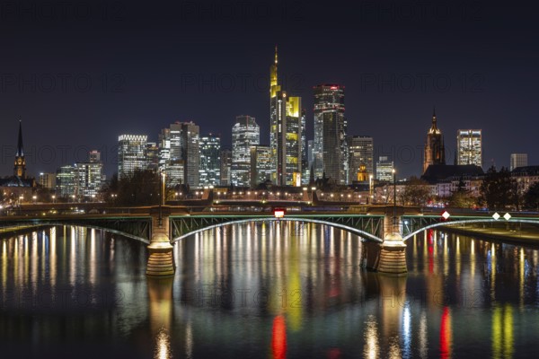 The lights of Frankfurt's banking skyline glow in the evening, Frankfurt am Main, Hesse, Germany