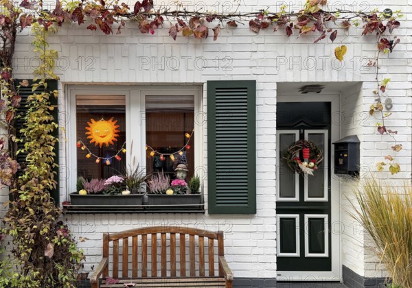 Decorated house façade for the traditional Martin procession in Tiefstraße, Altstadt, Kempen, Lower Rhine, North Rhine-Westphalia, Germany