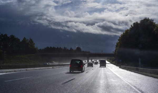 Cars on rain-wet A9 motorway during a thunderstorm, Hof, Upper Franconia, Bavaria, Germany