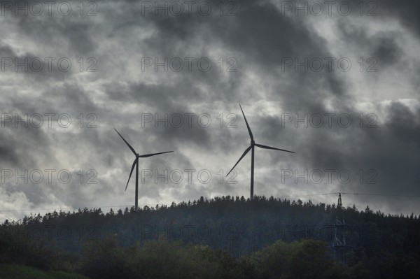 Wind turbines in thunderstorm rain, Bavarian Forest, Bavaria, Germany