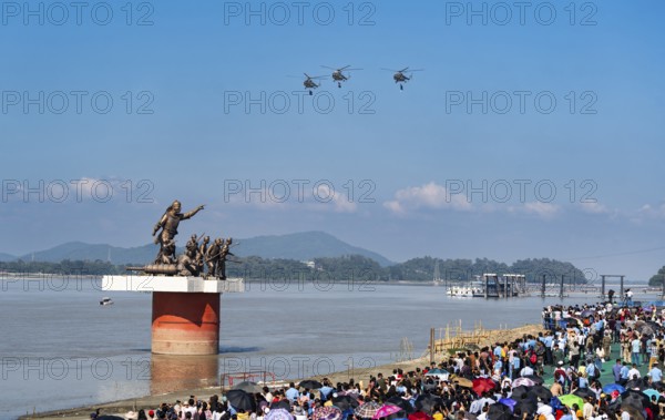 The Indian Air Force aerobatic team performs during an air show as part of the 93rd Air Force Day celebrations on November 8, 2025 in Guwahati, India