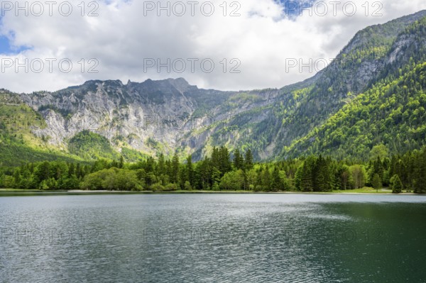 Landscape of Lake Offensee after rain when the sun comes through the clouds in spring, Salzkammergut, Austria
