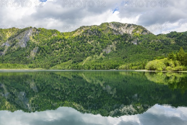 Landscape of Lake Offensee after rain when the sun comes through the clouds in spring, Salzkammergut, Austria