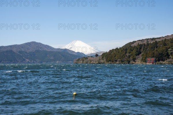 View of Lake Ashi with Mount Fuji volcano and peace torii from Hakone Shrine, Hakone, Japan