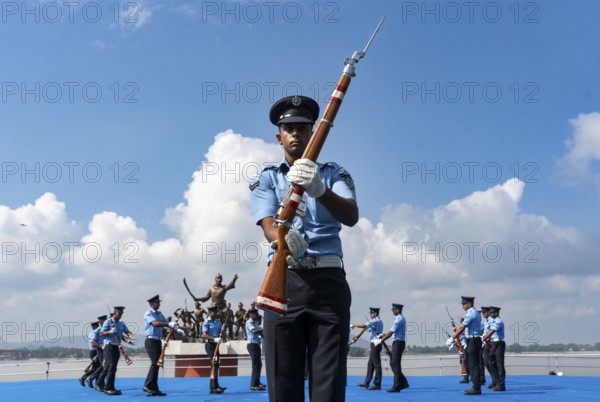 Indian Air Force personnel performs a bayonet drill demonstration on the bank of Brahmaputra river, during rehearsals ahead of the air show organised as part of the 93rd Air Force Day celebrations, on November 5, 2025 in Guwahati, India