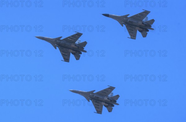 Indian Air Force aerobatic team performs during rehearsals ahead of the air show organised as part of the 93rd Air Force Day celebrations, on November 5, 2025 in Guwahati, India