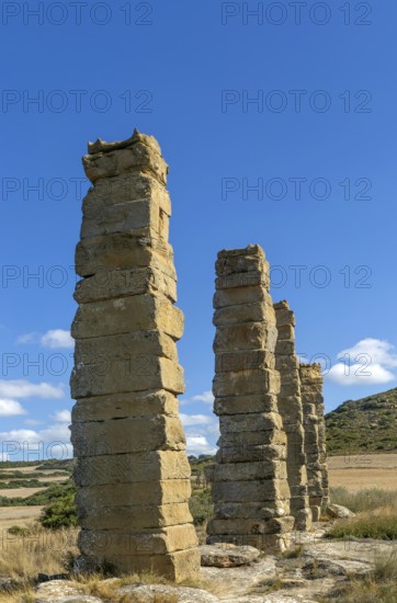 Stone columns of ancient aqueduct, Roman site of Los Banales, near Layana, Zaragoza province, Aragon, Spain
