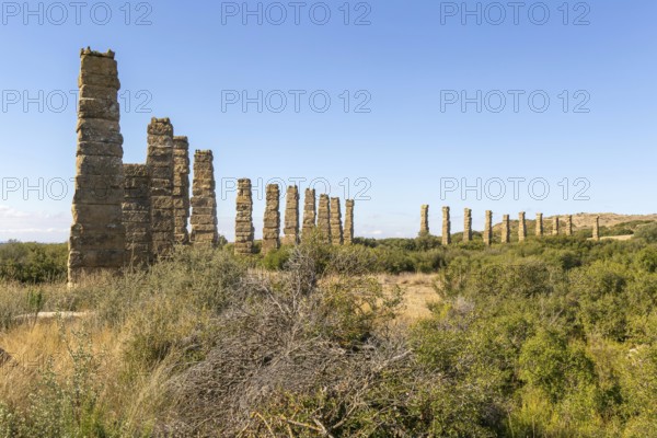 Stone columns of ancient aqueduct, Roman site of Los Banales, near Layana, Zaragoza province, Aragon, Spain