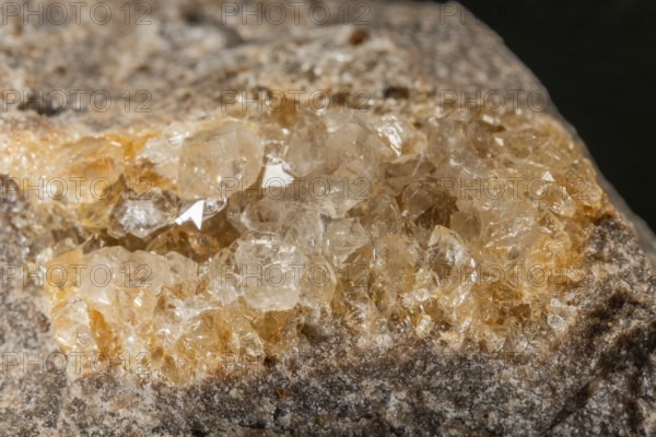 Translucent crystals shimmer in granite rocks. The discovery takes place in summer in a quiet, mountainous region. Bas Rhin, Alsace, France