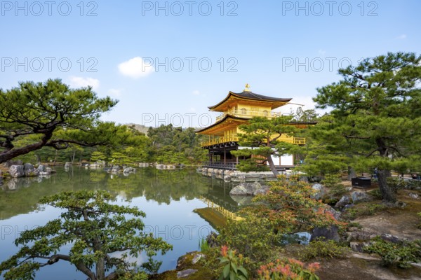 Golden Pavilion reflected in pond, Japanese garden, Golden Pavilion Temple, Kinkaku-ji reliquary, Buddhist temple complex, Kyoto, Japan
