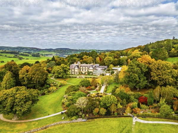 Autumn colours over Bodnant House and Garden from a drone, Conwy River, Colwyn Bay, Conwy, Wales, England, United Kingdom