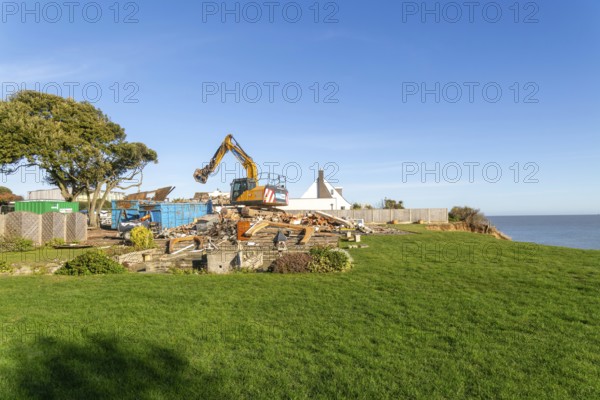 Demolition of Jean Flick's house, The Warren, Thorpeness, Suffolk, England, UK due to rapid coastal erosion of the North Sea coast, October 2025