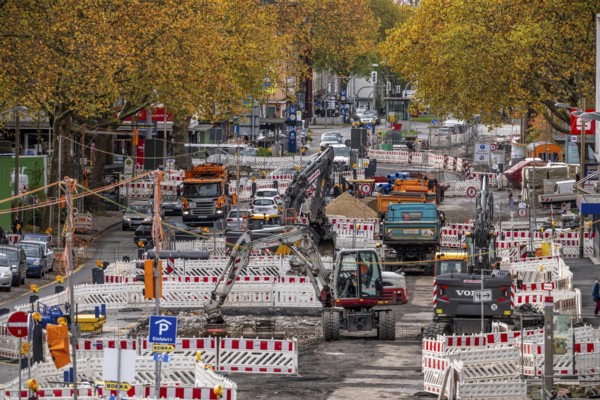 Large-scale construction site on Alleestrasse in downtown Bochum, road construction, construction of new cycle lanes, sidewalks, road surfaces, renewal of canals and water collection systems, trenches, for rainwater, greening, sustainable and modern road conversion, North Rhine-Westphalia, Germany