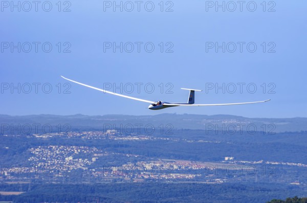 A Schempp-Hirth Nimbus 4M motor glider, D-KAOL registration, during a screening as part of an air show at the Rossfeld Air Sports Association on Rossfeld in Metzingen-Glems, Baden-Württemberg, Germany, for editorial use only