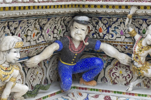 Decorative elements with pop culture references (for example comics, superheroes) in the stucco and porcelain vases outside and inside the art hall with modern art trends such as minimalism and abstraction, Wat Pariwat, Yan Nawa district, Bangkok, Thailand