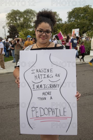 Detroit, Michigan USA - 18 October 2025 - A large crowd gathered for a 'No Kings' rally, protesting President Trump's actions against immigrants and against democratic institutions