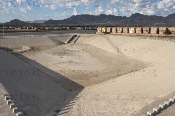 Las Vegas, Nevada - A water detention basin, one of about 100 built by the Clark County Regonal Flood Control District to temporarily collect stormwater, protecting neighborhoods from flooding